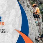 the two women are climbing on a rockafter identifying the rope diameter sizes