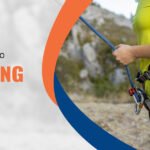 A girl is tightly holding the Rope Climbing Gear while climbing on a rock