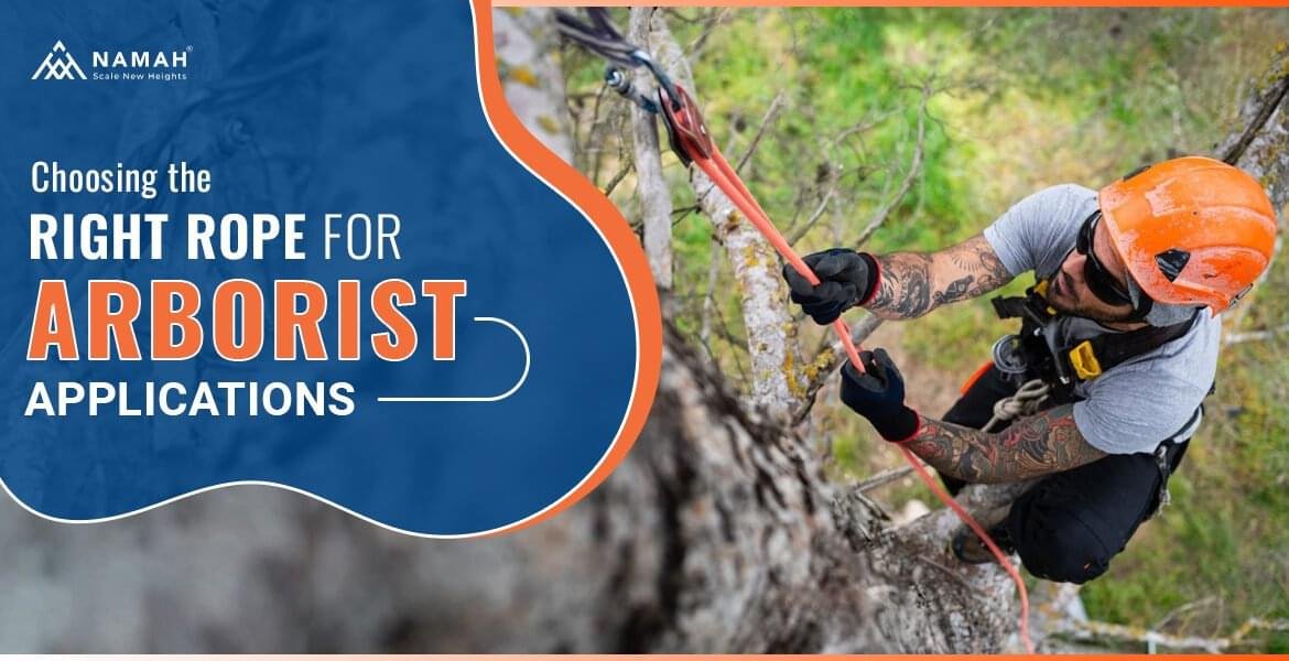 A Man Is Climbing On A Rock With The Help Of Arborist Climbing Rope