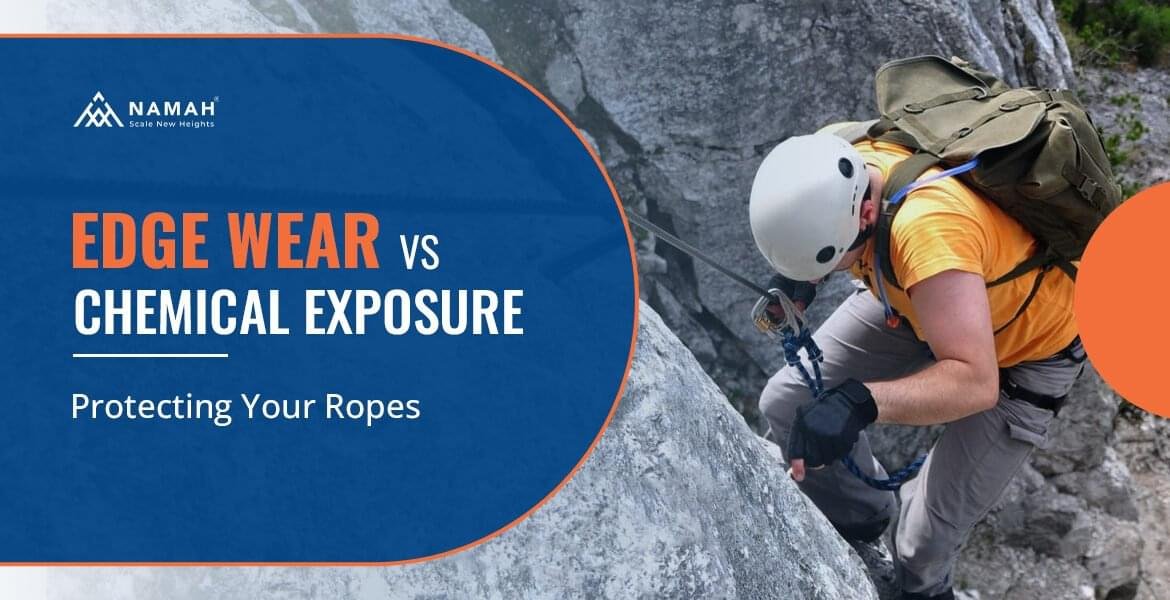 A Man Is Climbing On A Rock With Rope Edge Wear